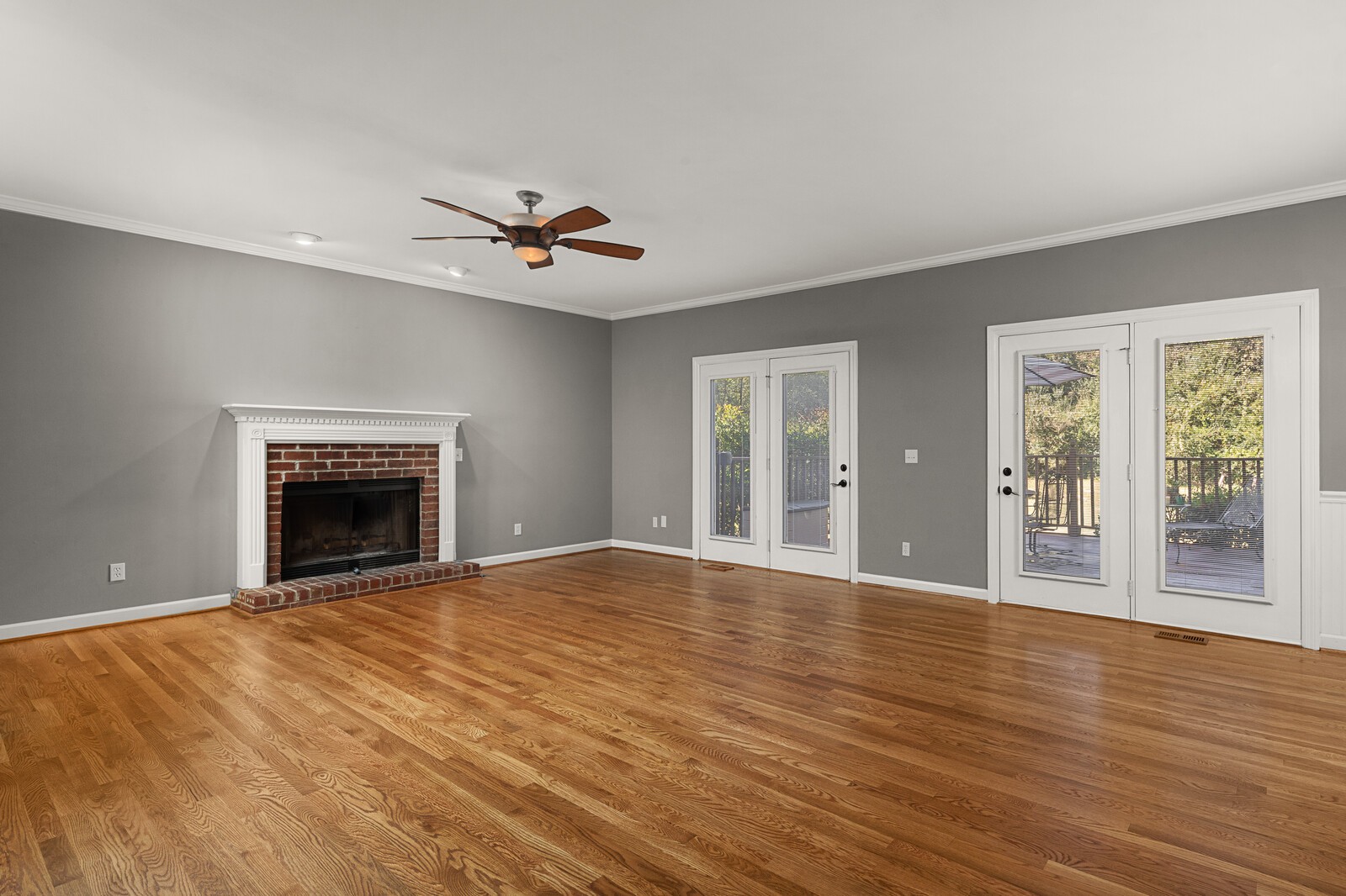 341 Sandcastle Road Franklin, TN 37069 - Photo 9 of 41 a view of an empty room with window and wooden floor