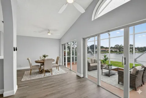 a kitchen with stainless steel appliances a refrigerator sink and microwave