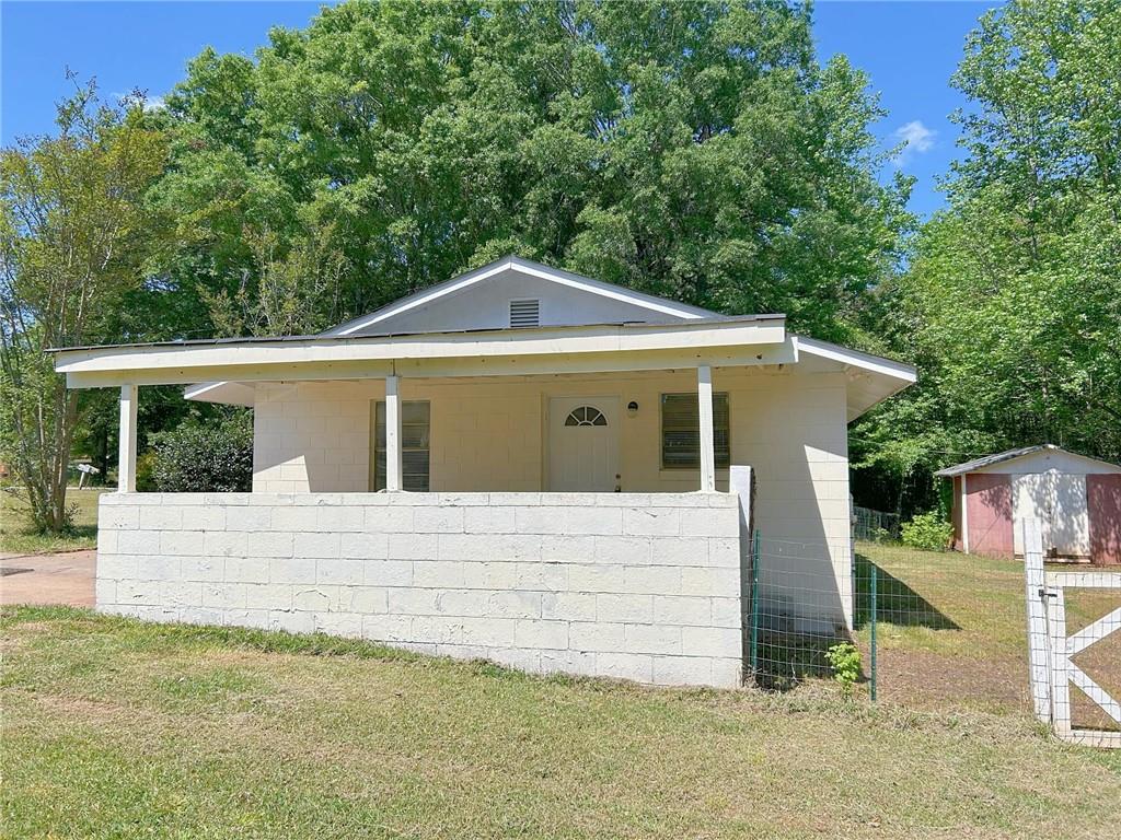 271 Rehoboth Road Griffin, GA 30223 - Photo 3 of 9 a front view of a house with a garden