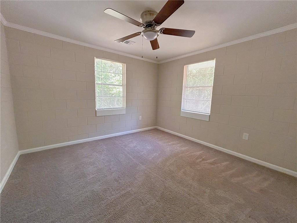 271 Rehoboth Road Griffin, GA 30223 - Photo 7 of 9 a view of an empty room with a window