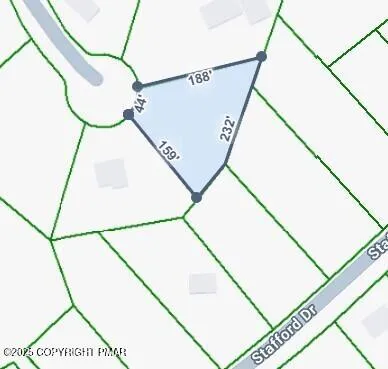 a view of a backyard of the house