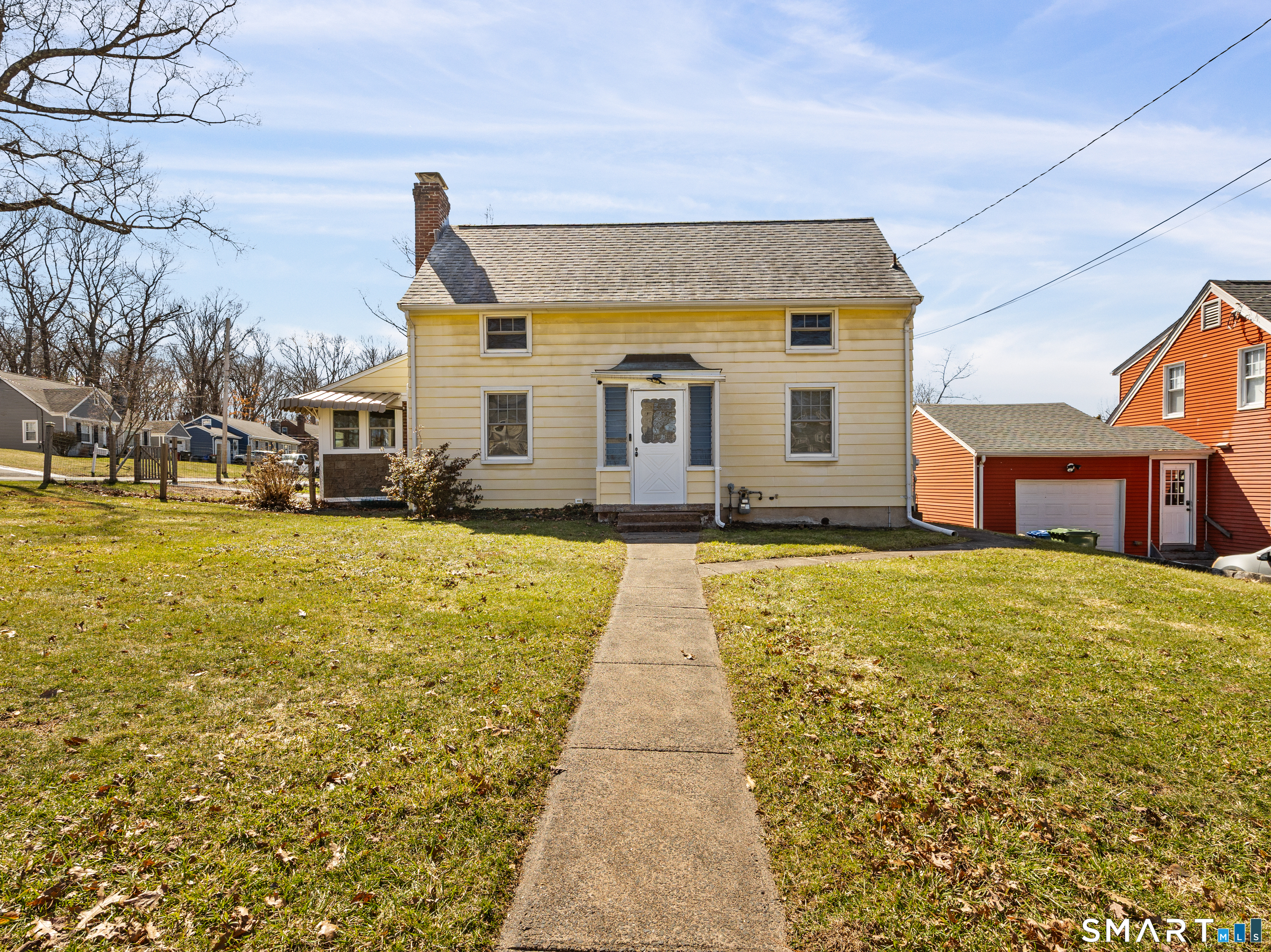 39 Lincoln Avenue Wallingford, CT 06492 - Photo 1 of 1 a front view of a house with a yard