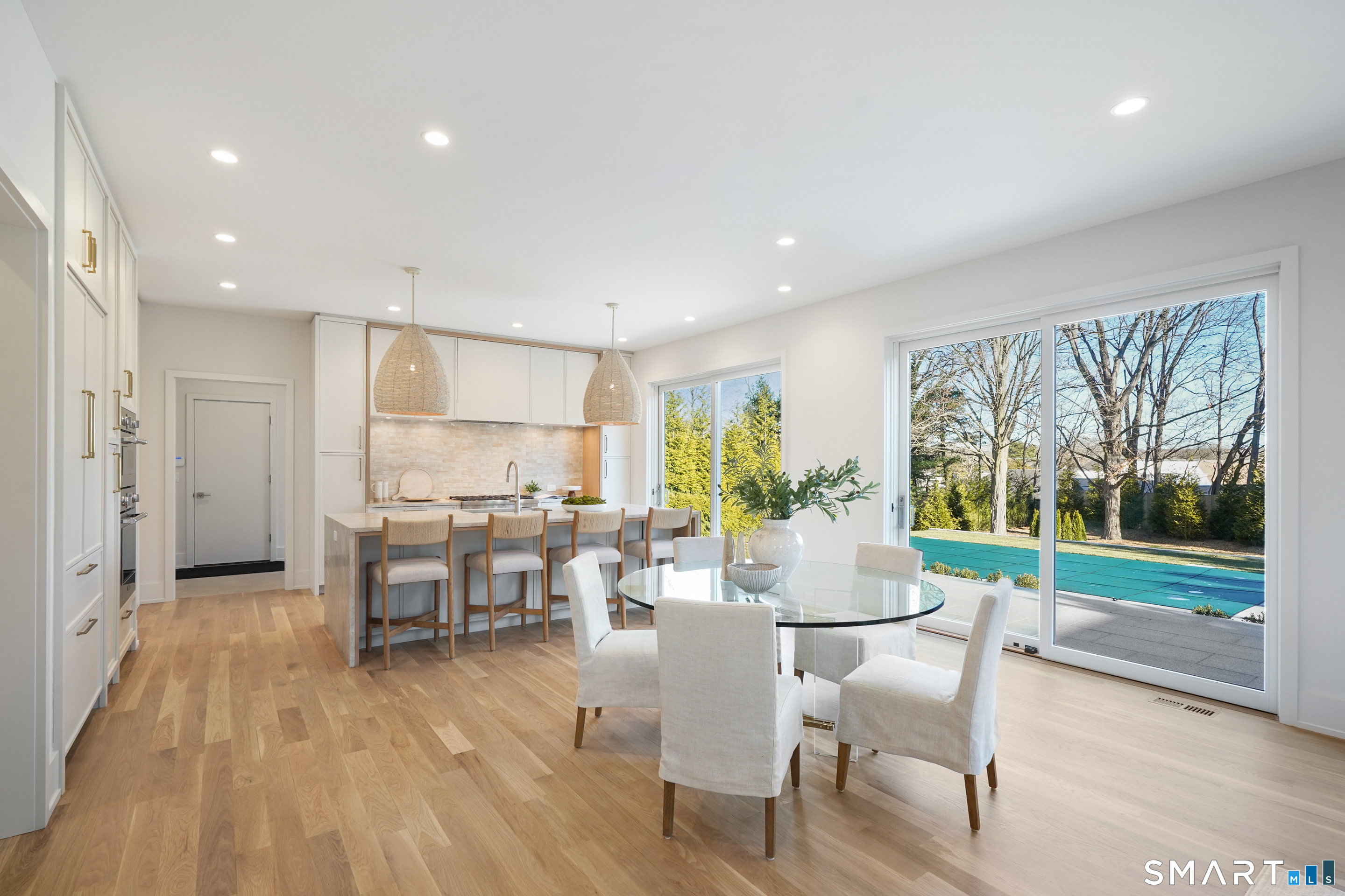 18 Woodhill Road Westport, CT 06880 - Photo 13 of 38 a view of a dining room with furniture window and wooden floor