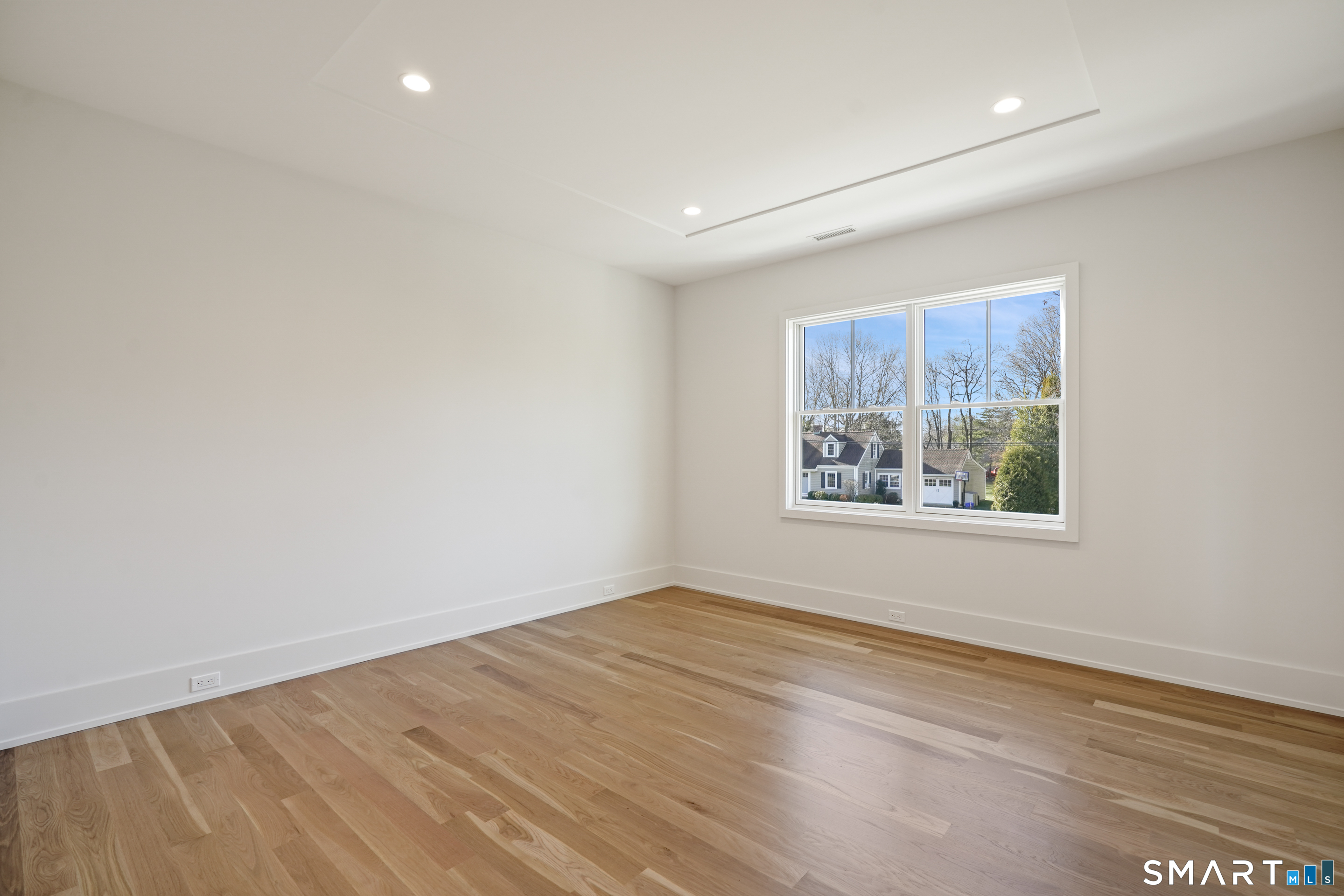 18 Woodhill Road Westport, CT 06880 - Photo 25 of 38 an empty room with a window