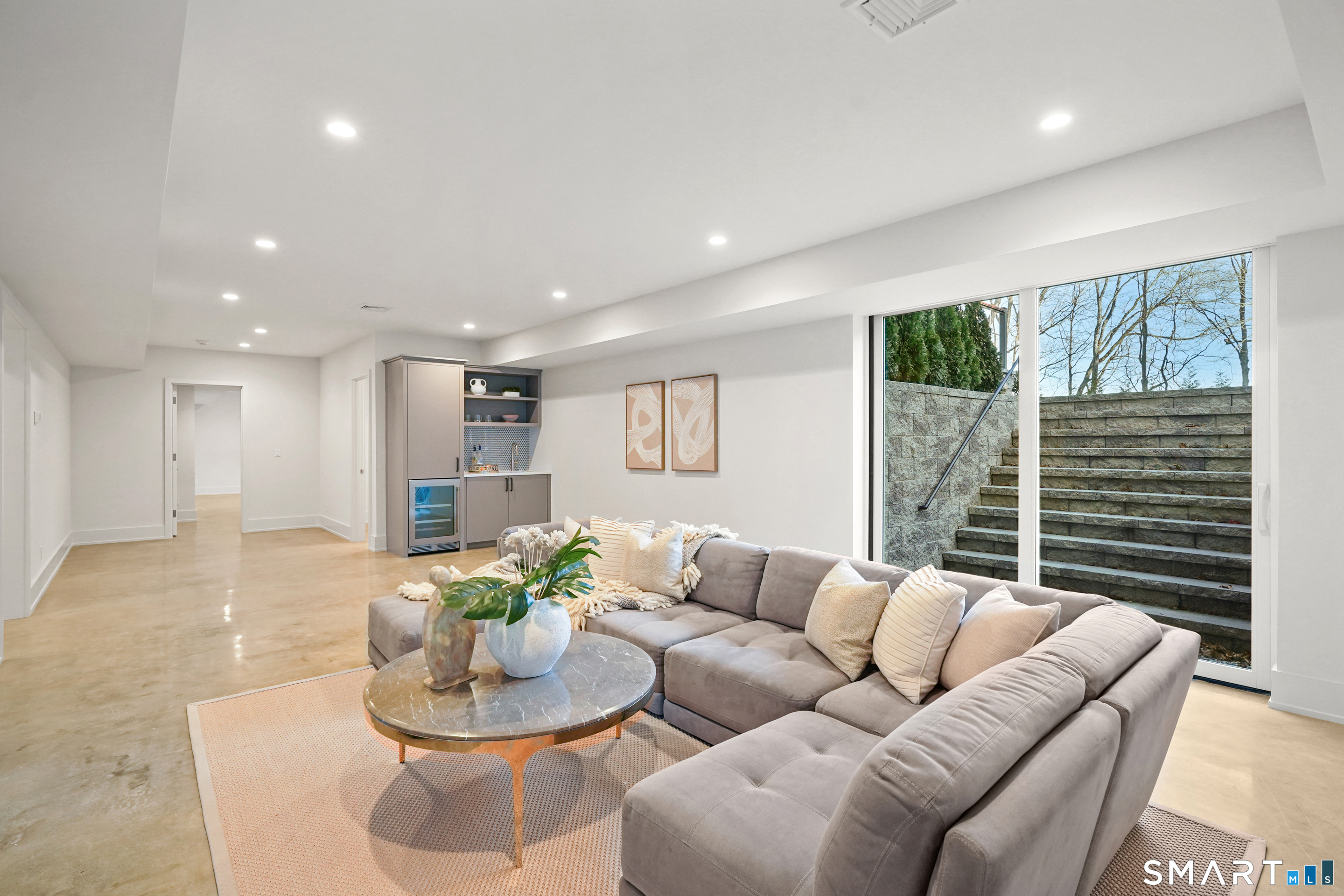 18 Woodhill Road Westport, CT 06880 - Photo 34 of 38 a living room with furniture and a large window