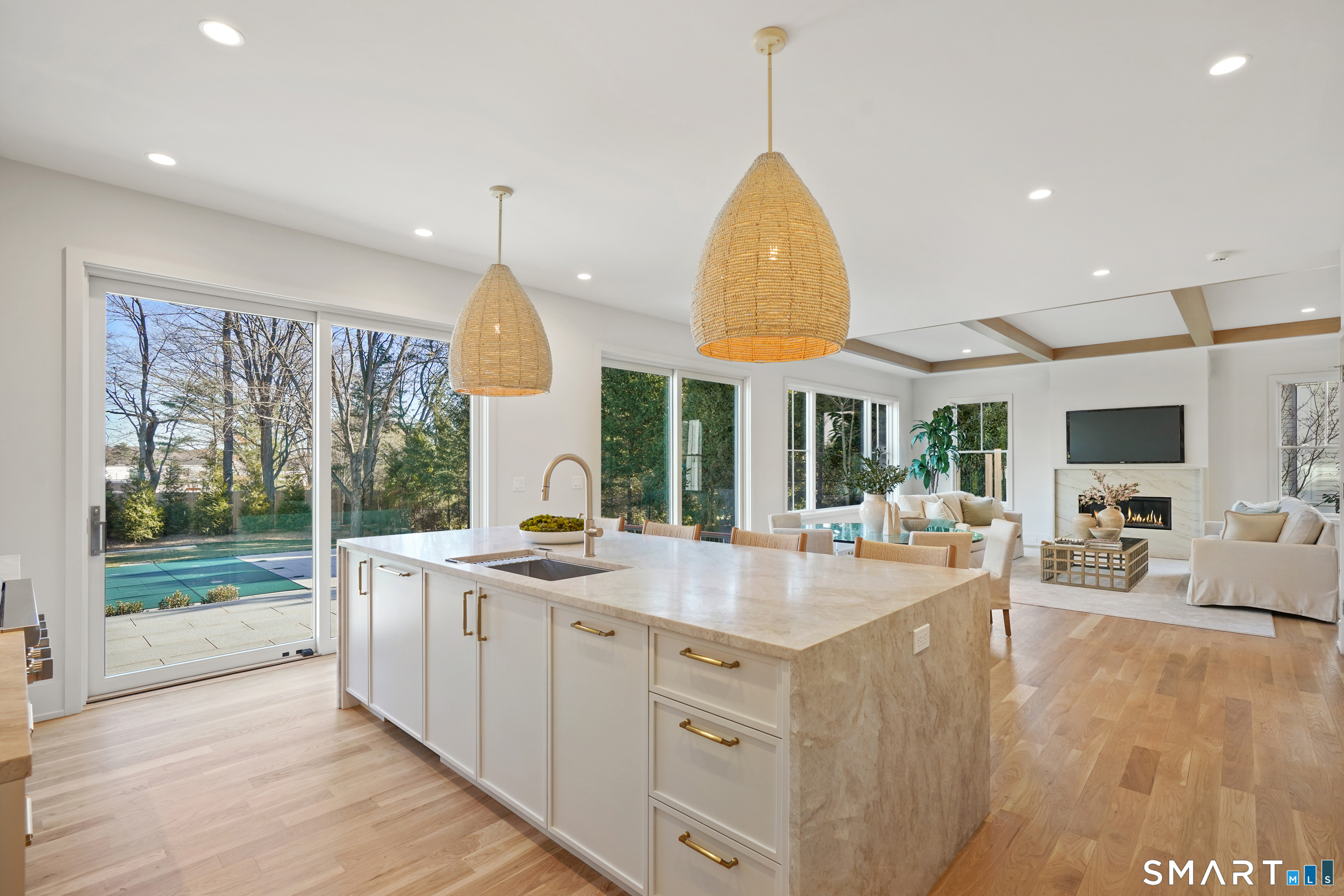 18 Woodhill Road Westport, CT 06880 - Photo 9 of 38 a view of a kitchen with furniture and wooden floor