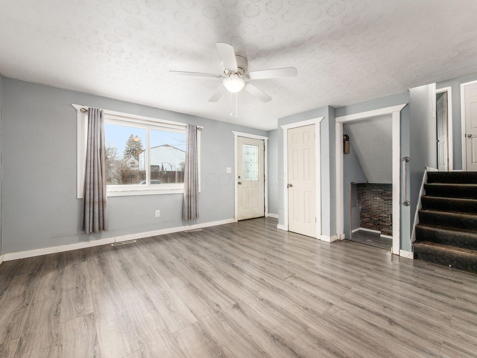 3622 Alpena Road Columbus, OH 43232 - Photo 5 of 35 Luxury Vinyl Plank Flooring. Ceiling Fan.