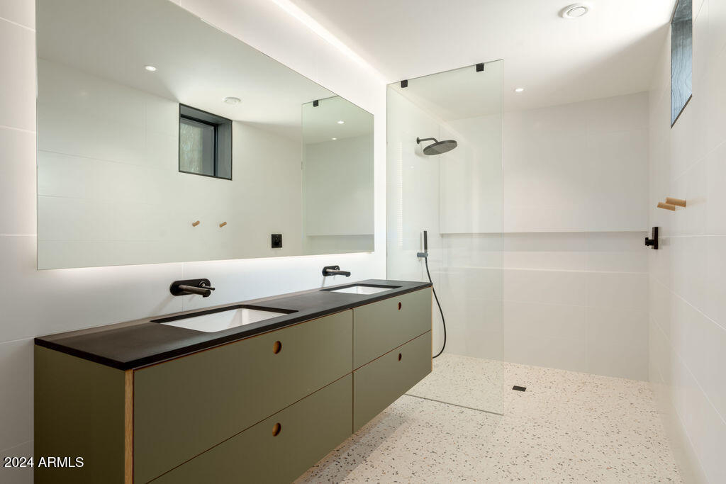 1740 East Ocotillo Road, Unit 4 Phoenix, AZ 85016 - Photo 14 of 20 a bathroom with a double vanity sink mirror and shower