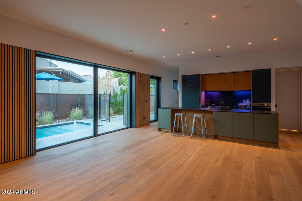 1740 East Ocotillo Road, Unit 4 Phoenix, AZ 85016 - Photo 15 of 20 a view of a room with gym equipment