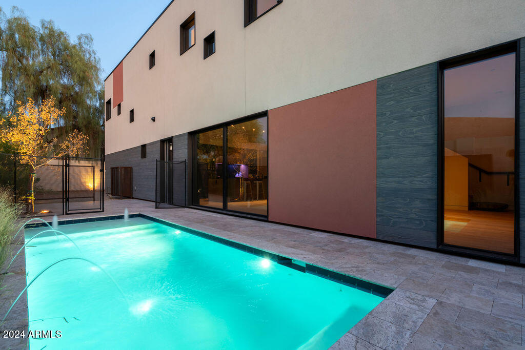 1740 East Ocotillo Road, Unit 4 Phoenix, AZ 85016 - Photo 17 of 20 a view of an apartment with a backyard