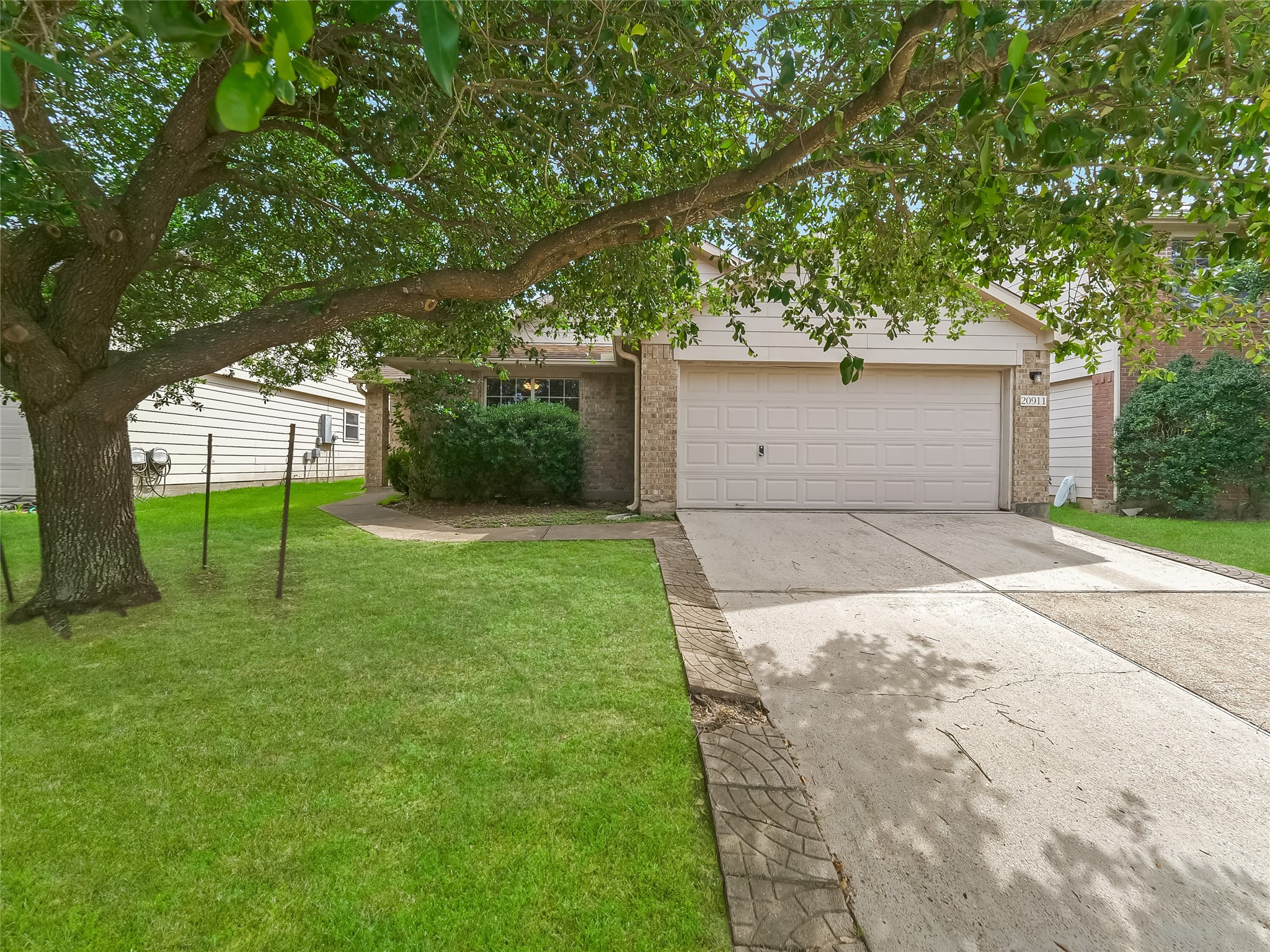 20911 Harvest Terrace Lane Spring, TX 77379 - Photo 3 of 28 Large Oak Tree