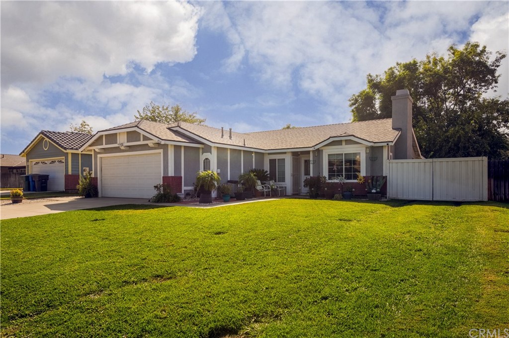 4314 Hale Street Riverside, CA 92501 - Photo 1 of 1 a front view of a house with a garden
