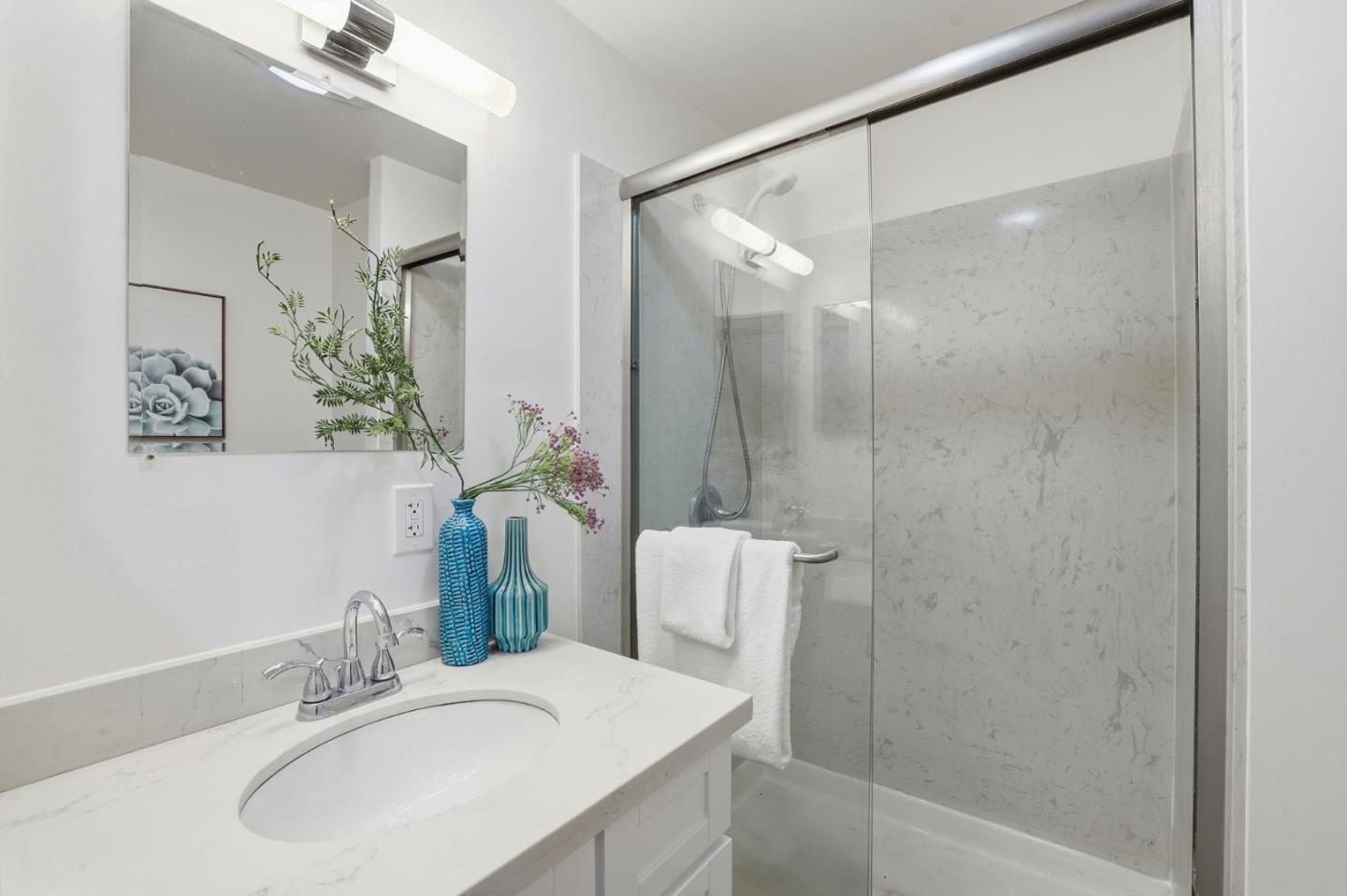 555 Umbarger Road, Unit 31 San Jose, CA 95111 - Photo 11 of 18 a bathroom with a sink and a mirror