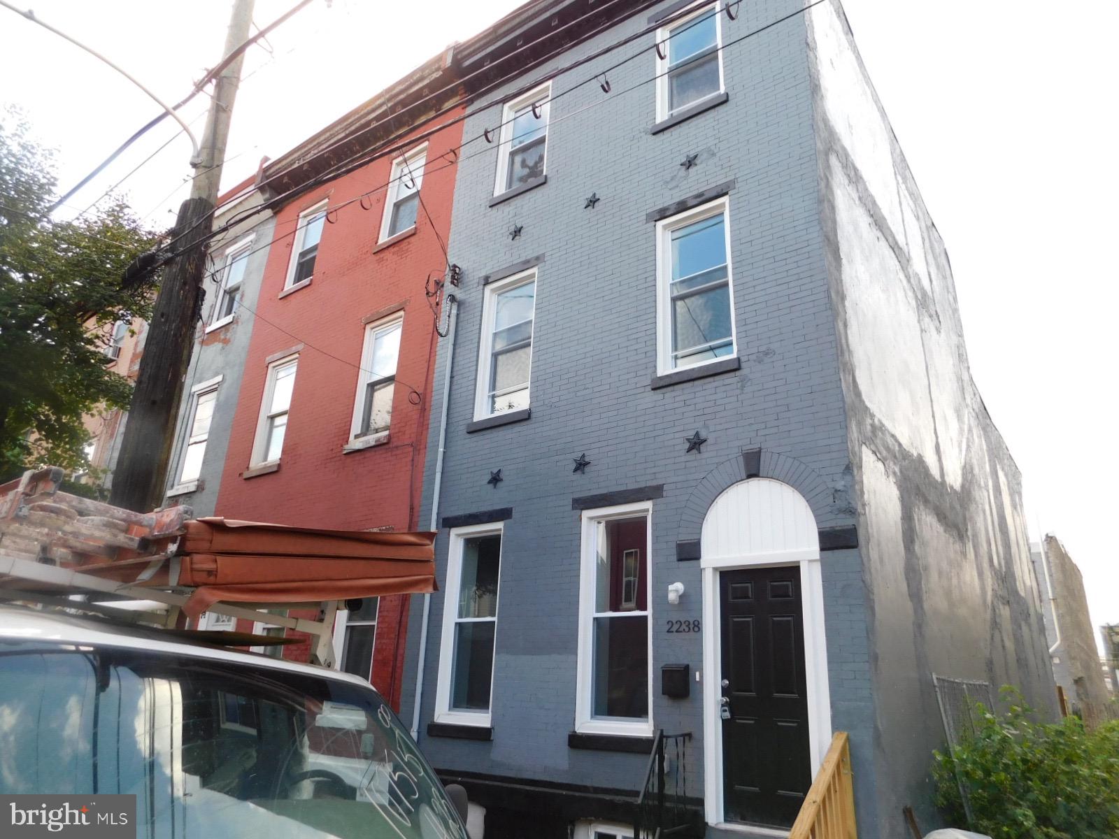 2238 Master Street Philadelphia, PA 19121 - Photo 1 of 24 a front view of a building with balcony