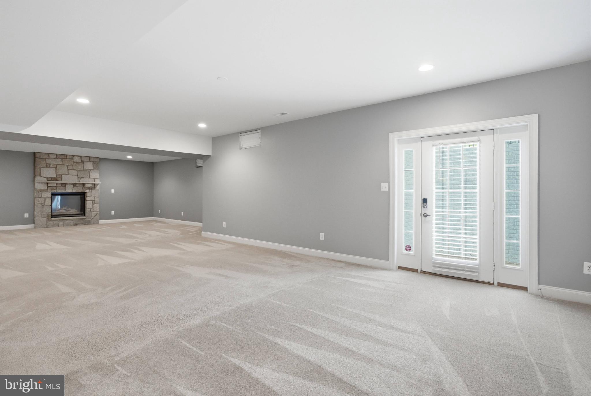18475 Kerill Road Triangle, VA 22172 - Photo 26 of 99 a view of an empty room with a fireplace