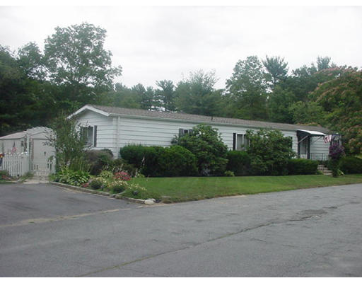 31 Longboat Road, Unit 31 Wareham, MA 02576 - Photo 1 of 14 a view of a house with a yard and pathway