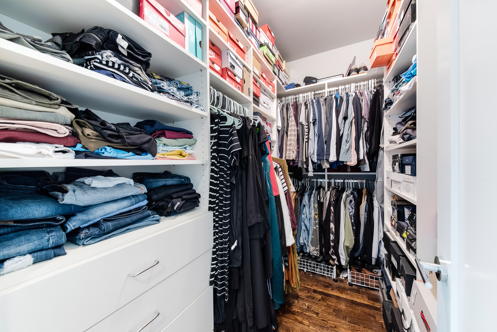 4029 South Ellis Avenue, Unit 3N Chicago, IL 60653 - Photo 11 of 19 a view of walk in closet with clothes and shoes