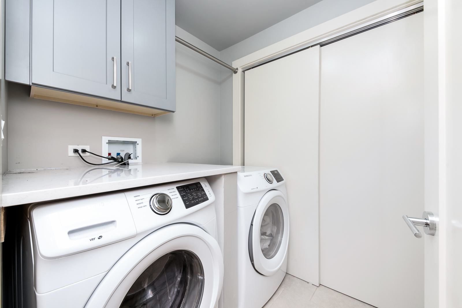 4029 South Ellis Avenue, Unit 3N Chicago, IL 60653 - Photo 17 of 19 a view of storage and utility room with washer and dryer