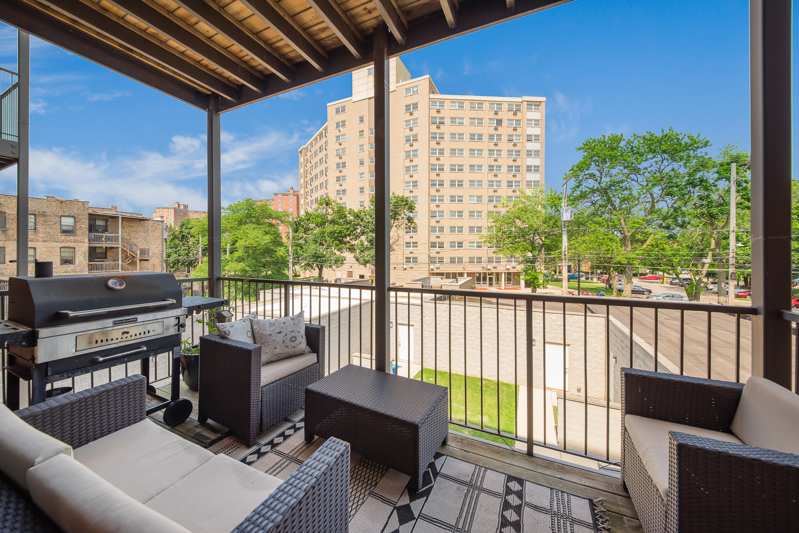 4029 South Ellis Avenue, Unit 3N Chicago, IL 60653 - Photo 19 of 19 a balcony with furniture