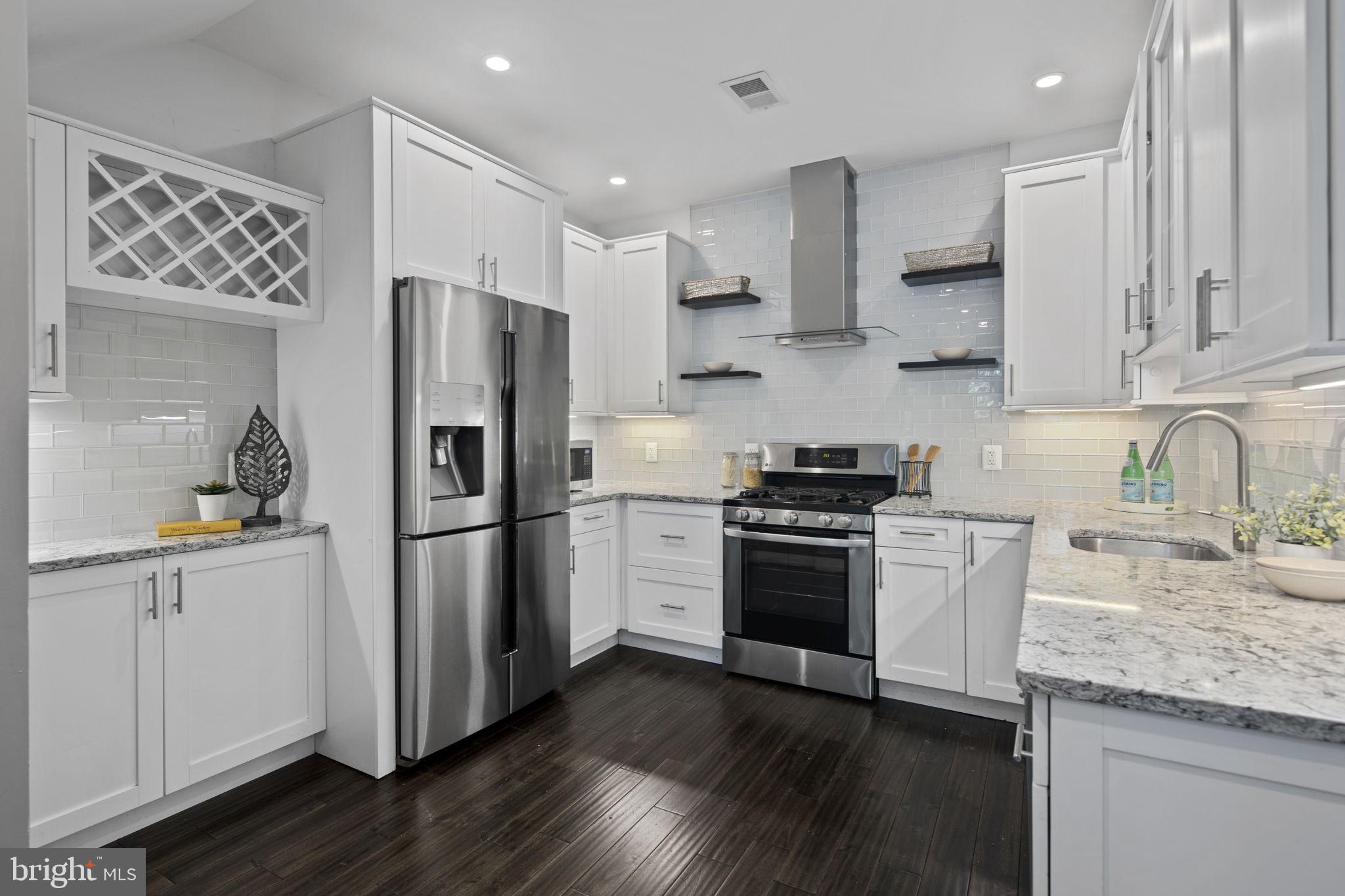 1117 Allison Street Northwest, Unit 2 Washington, DC 20011 - Photo 3 of 31 High-end kitchen w/ quartz countertops