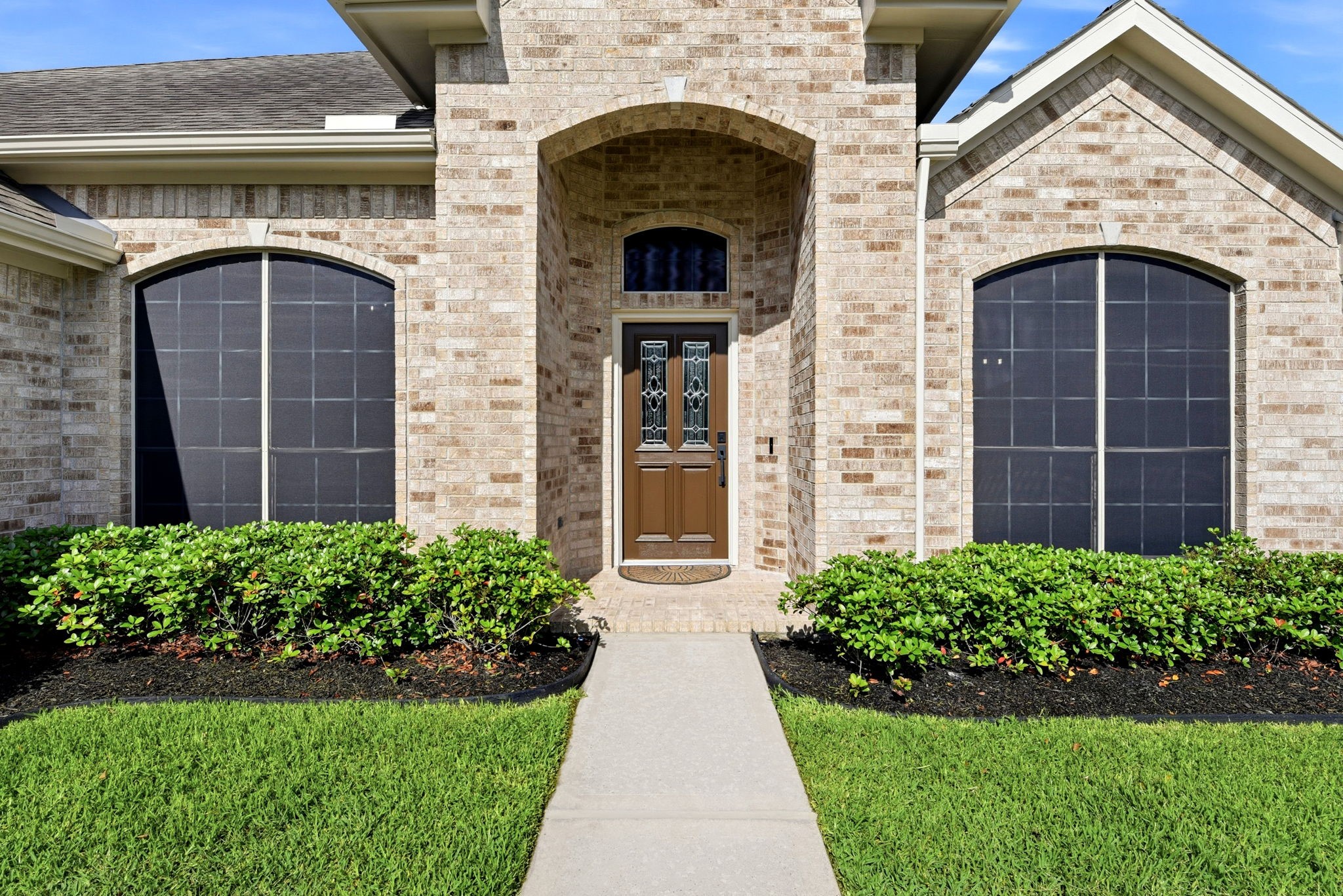 29819 South Legends Village Circle Spring, TX 77386 - Photo 7 of 48 a front view of a house with a garden