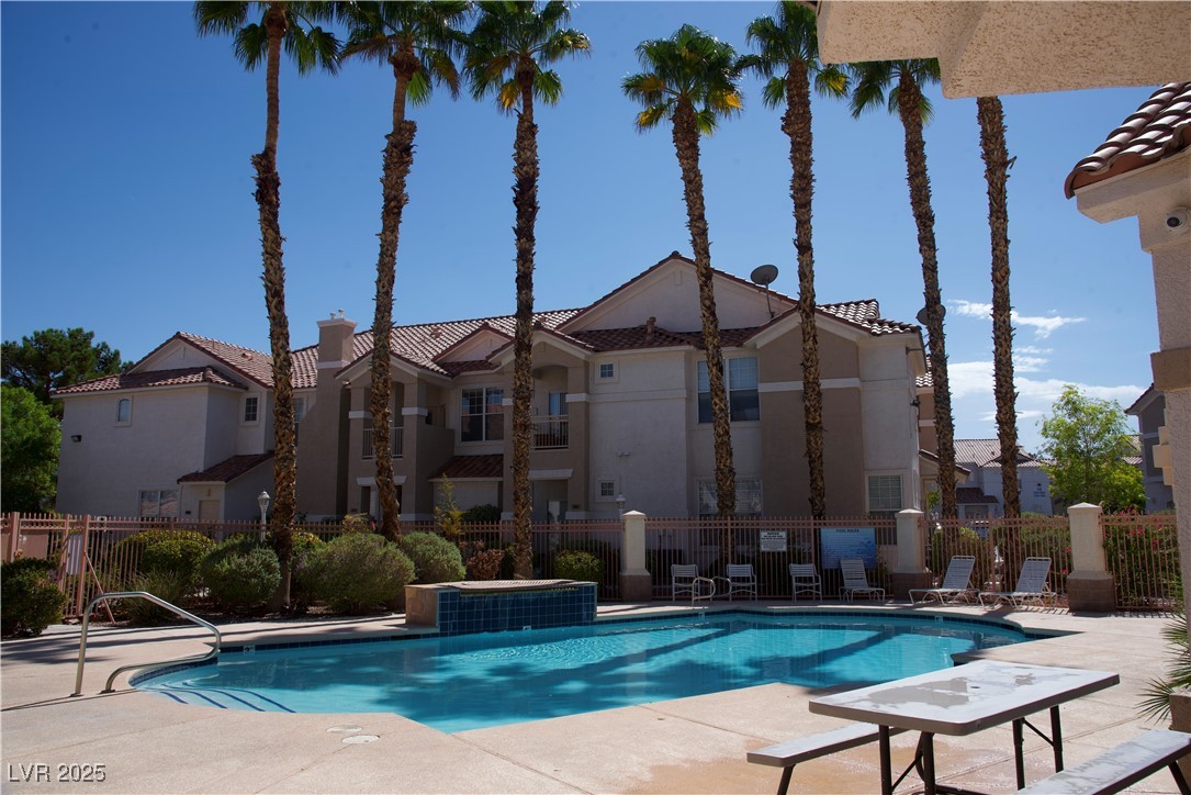 8555 West Russell Road, Unit 1078 Las Vegas, NV 89113 - Photo 30 of 34 Community pool with a patio