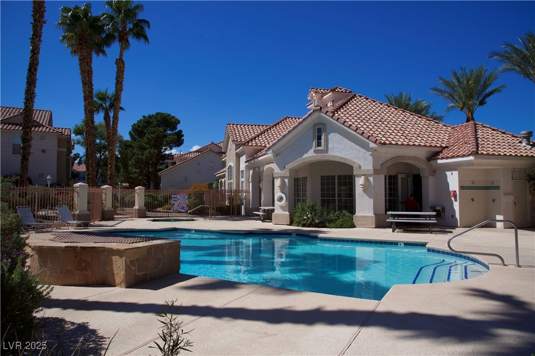 8555 West Russell Road, Unit 1078 Las Vegas, NV 89113 - Photo 7 of 34 Community pool featuring a patio area