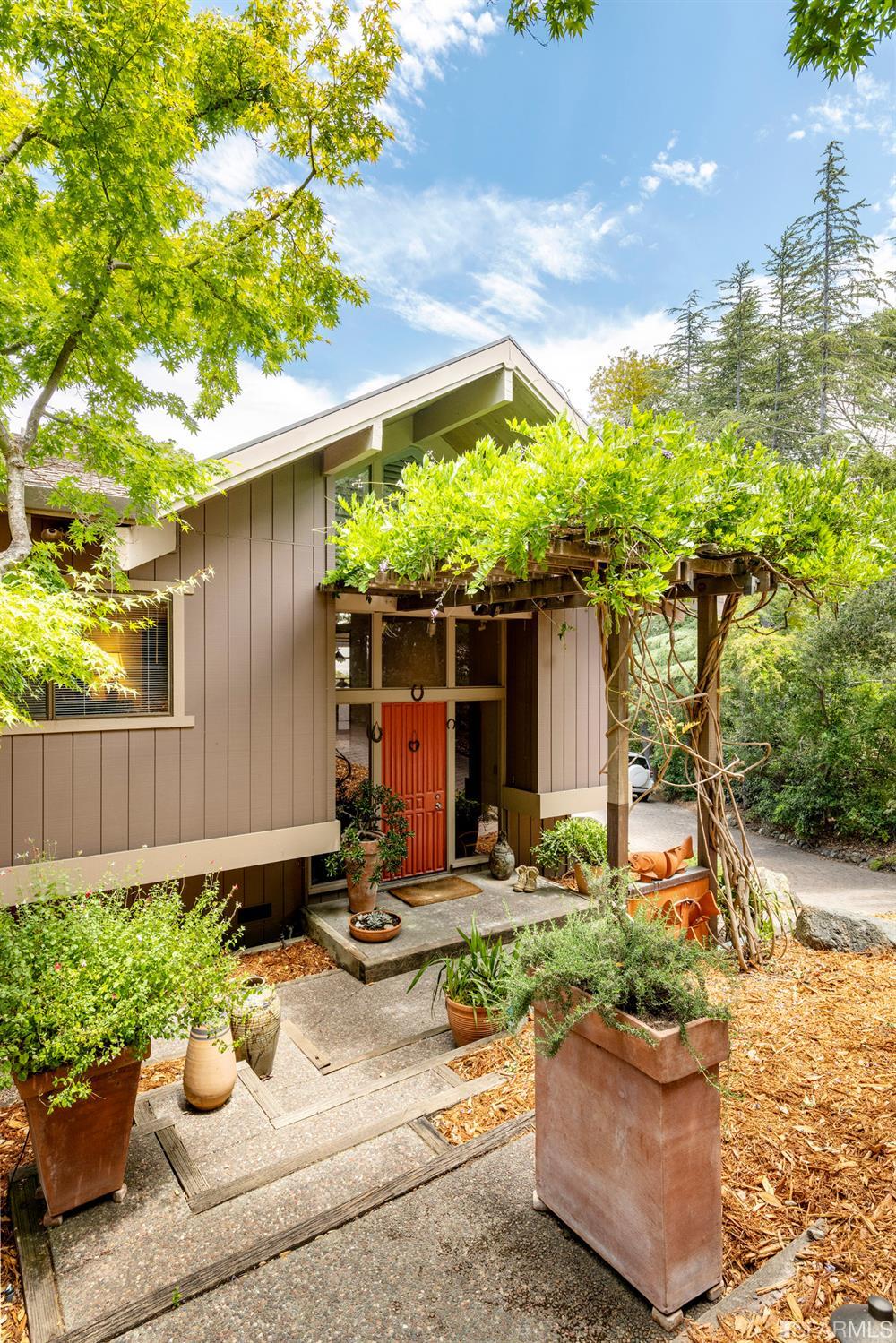 250 Hardwick Road Woodside, CA 94062 - Photo 11 of 50 a front view of a house with garden