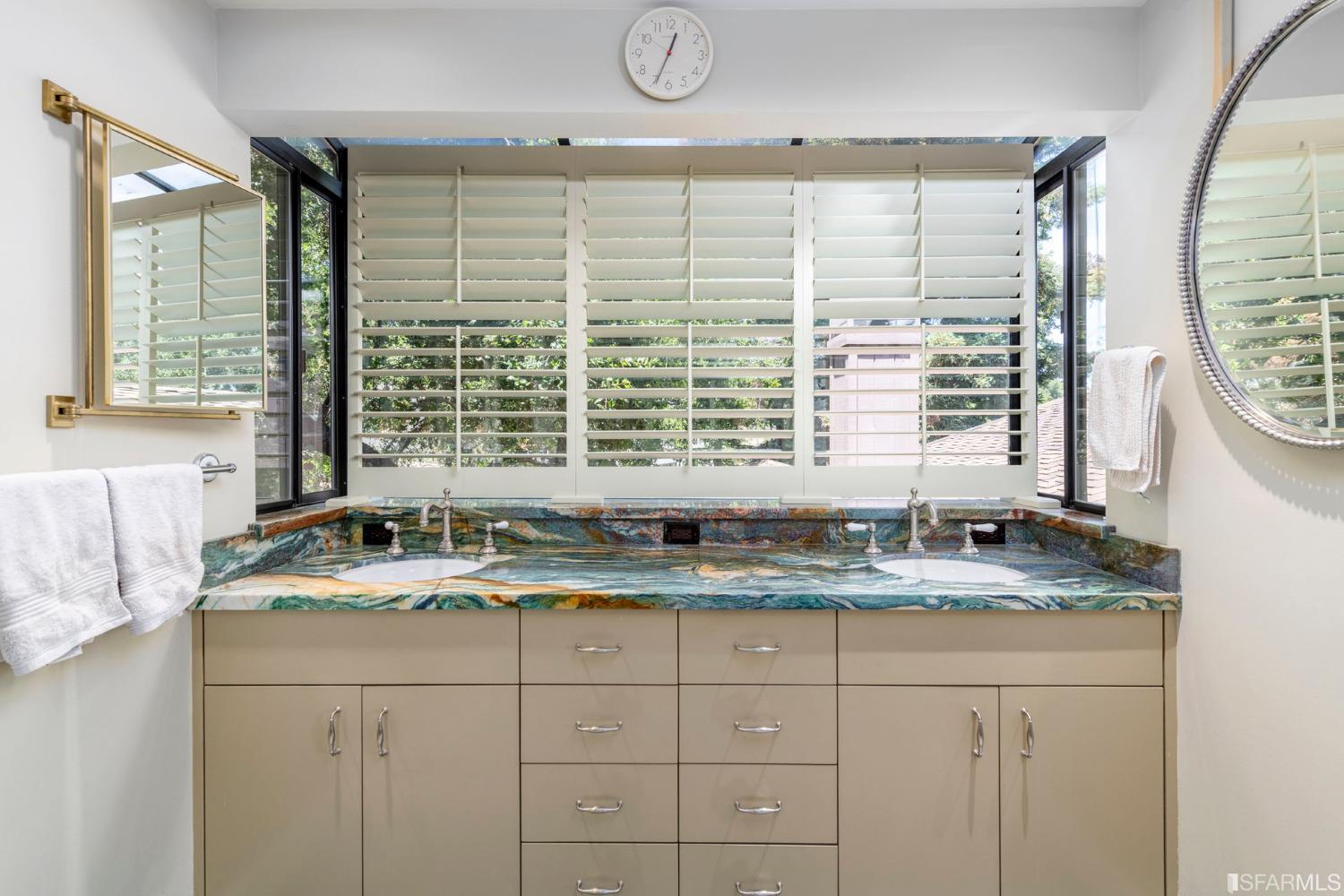 250 Hardwick Road Woodside, CA 94062 - Photo 37 of 50 a bathroom with a granite countertop sink and a window