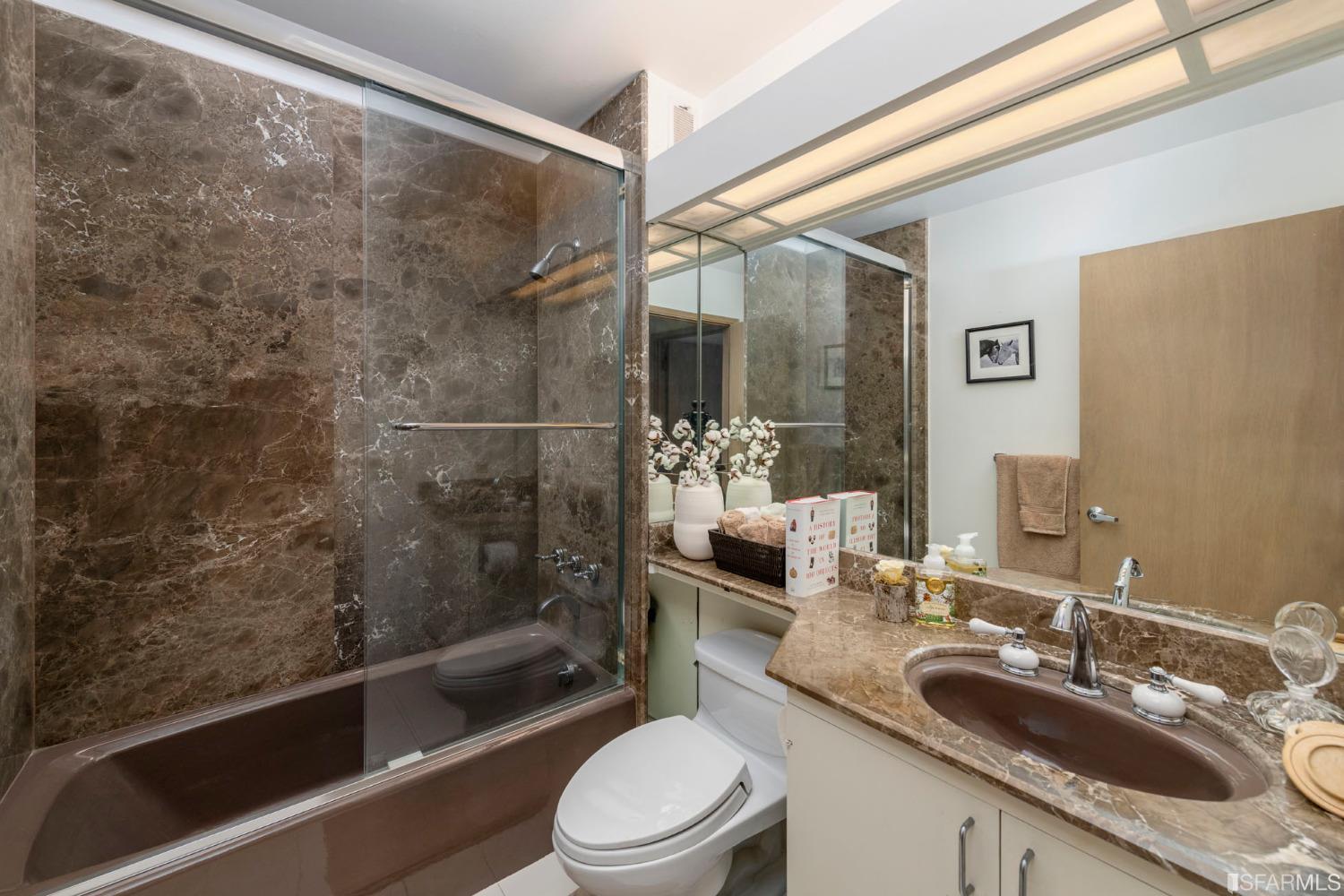 250 Hardwick Road Woodside, CA 94062 - Photo 40 of 50 a bathroom with a sink a toilet and shower