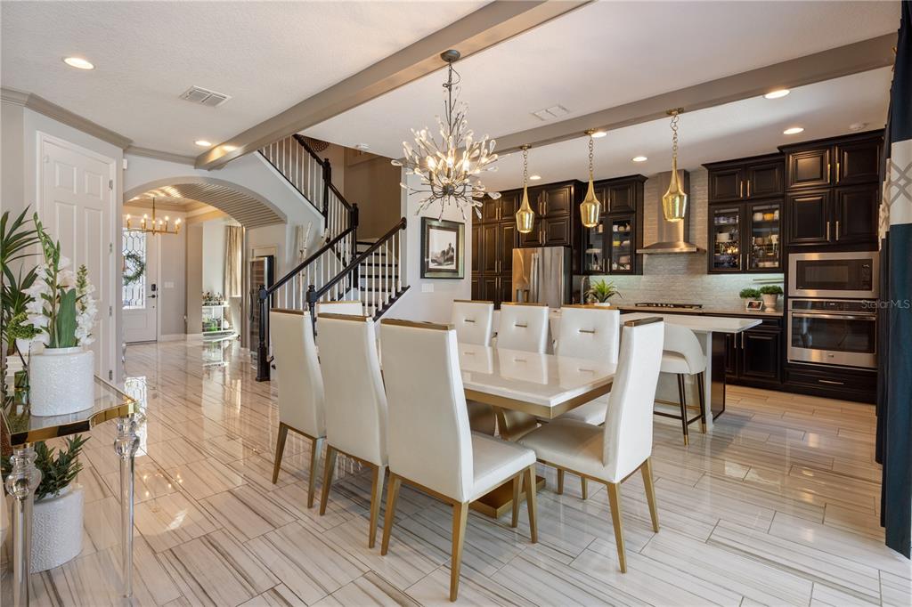 10950 Lemon Lake Boulevard Orlando, FL 32836 - Photo 11 of 53 a dining room with furniture and wooden floor