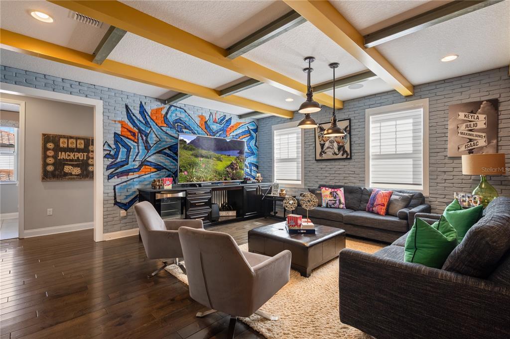 10950 Lemon Lake Boulevard Orlando, FL 32836 - Photo 16 of 53 a living room with furniture and a flat screen tv