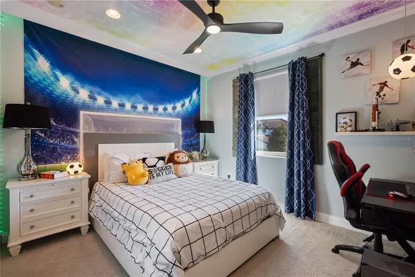 a bedroom with a bed and dresser