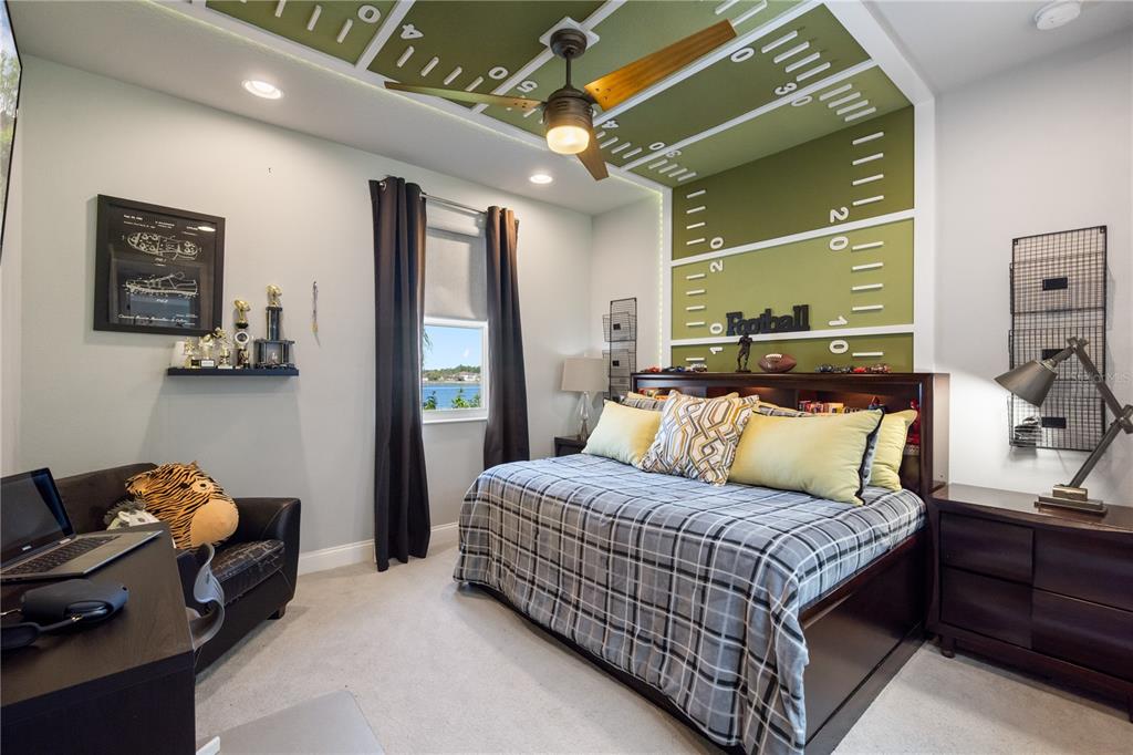 10950 Lemon Lake Boulevard Orlando, FL 32836 - Photo 25 of 53 a bedroom with a bed and window