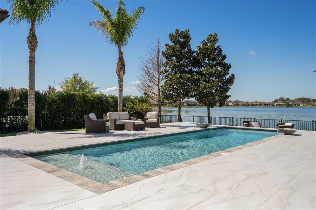 10950 Lemon Lake Boulevard Orlando, FL 32836 - Photo 33 of 53 a view of a backyard with a garden and plants