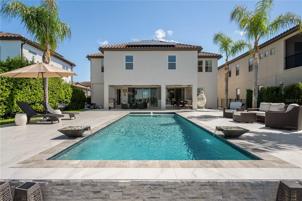10950 Lemon Lake Boulevard Orlando, FL 32836 - Photo 37 of 53 a view of a house with backyard and sitting area