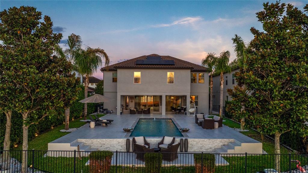 10950 Lemon Lake Boulevard Orlando, FL 32836 - Photo 38 of 53 an aerial view of a house with yard patio and fire pit