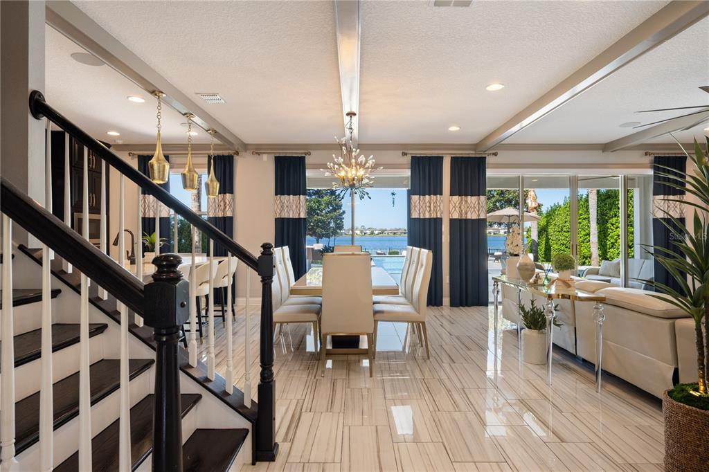 10950 Lemon Lake Boulevard Orlando, FL 32836 - Photo 8 of 53 a view of a dining room with furniture window and wooden floor