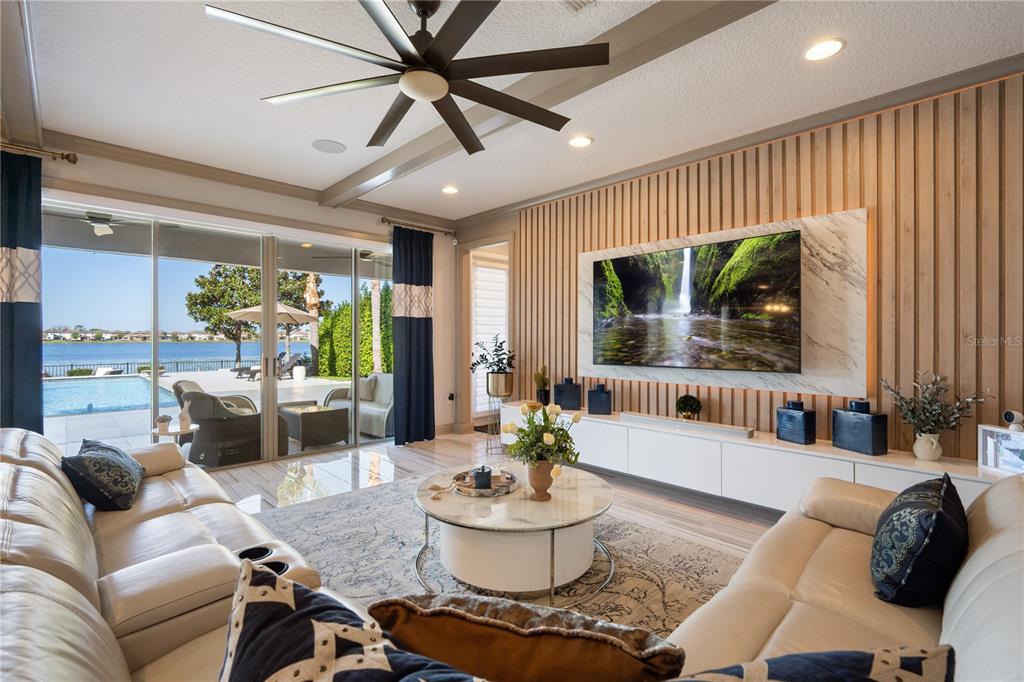 10950 Lemon Lake Boulevard Orlando, FL 32836 - Photo 9 of 53 a living room with furniture and a large window