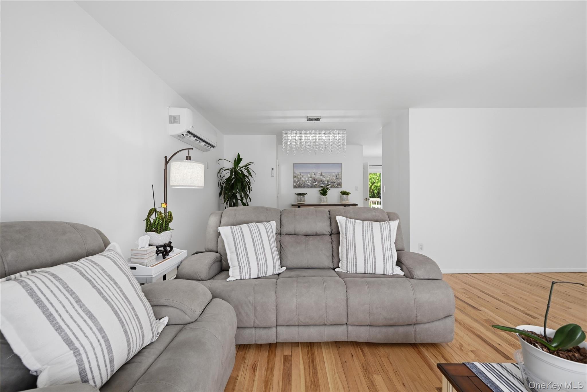 35 Randall Road Shoreham, NY 11786 - Photo 7 of 32 a living room with furniture and a couch