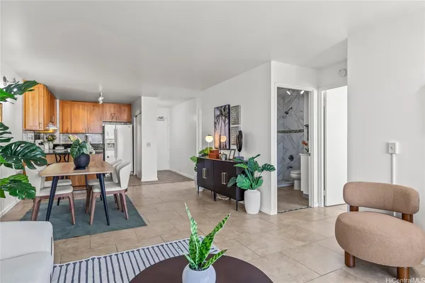 a living room with furniture and a rug