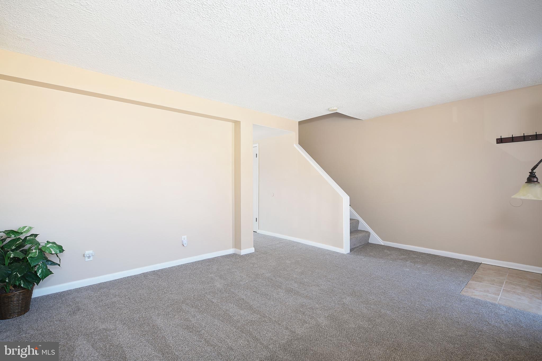 206 Cove Road Baltimore, MD 21221 - Photo 8 of 31 Spacious living room with neutral decor