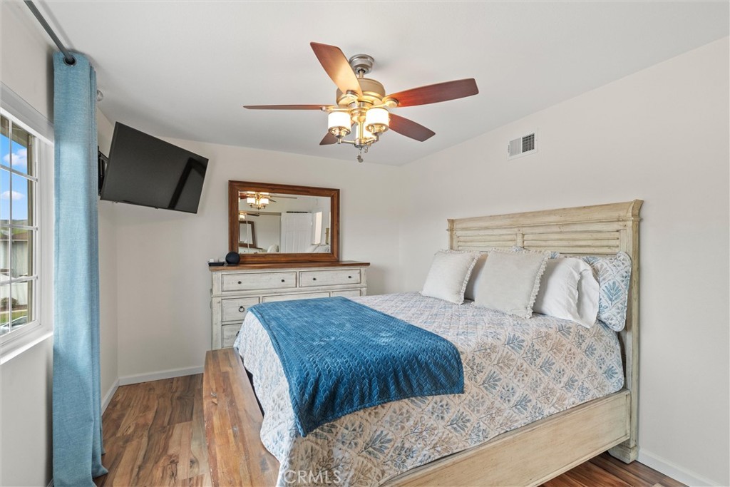 20800 Plum Canyon Road Saugus, CA 91350 - Photo 18 of 26 a bedroom with a bed and a flat screen tv