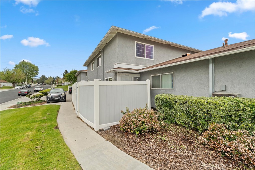 20800 Plum Canyon Road Saugus, CA 91350 - Photo 2 of 26 a front view of a house with a yard