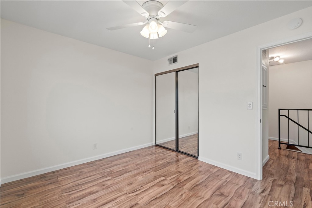 20800 Plum Canyon Road Saugus, CA 91350 - Photo 23 of 26 a view of empty room with wooden floor