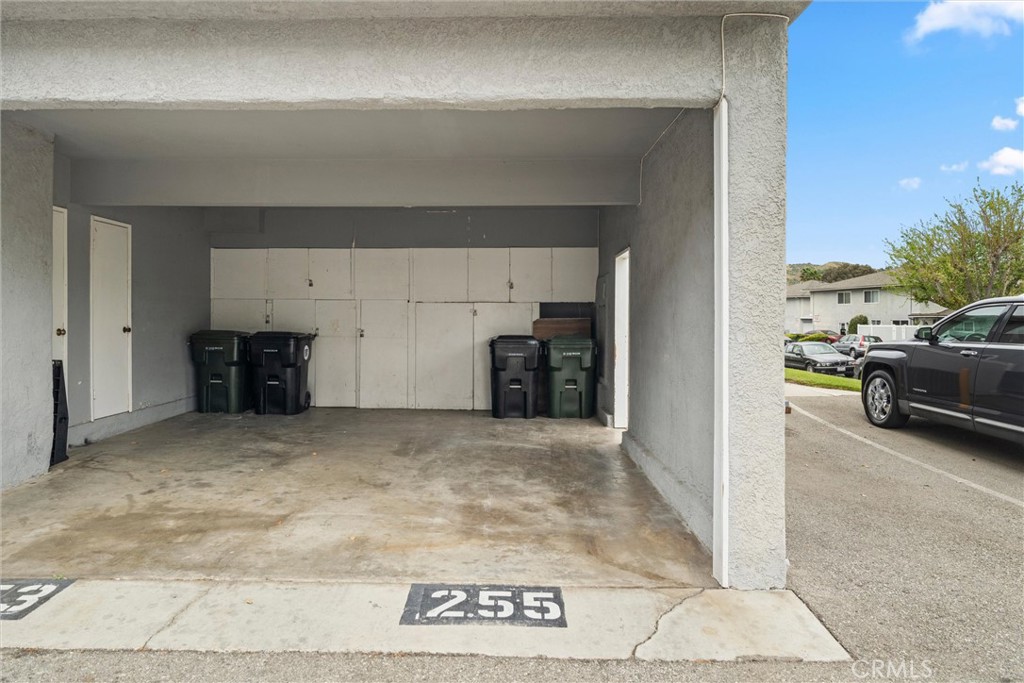 20800 Plum Canyon Road Saugus, CA 91350 - Photo 25 of 26 a view of livingroom with furniture and a car parked in it