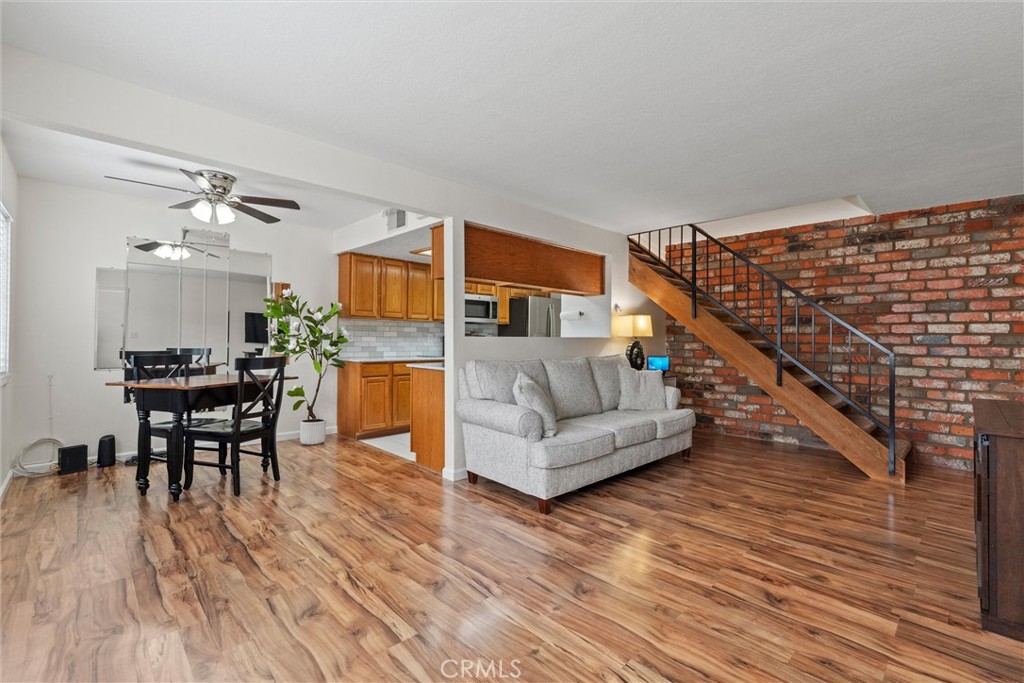 20800 Plum Canyon Road Saugus, CA 91350 - Photo 4 of 26 a living room with furniture and a wooden floor