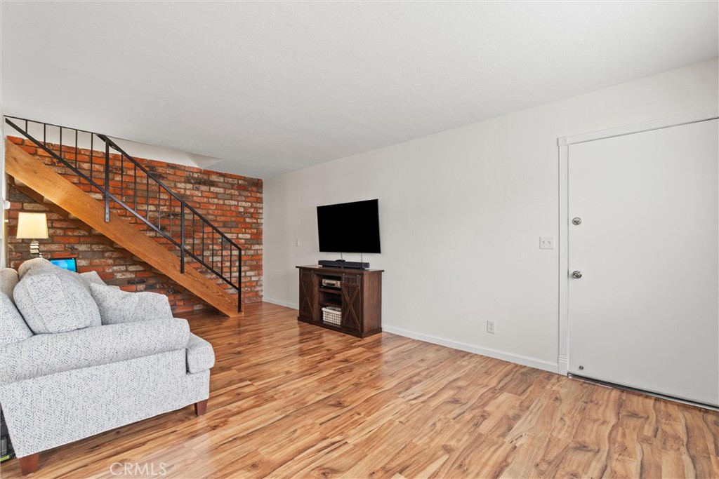20800 Plum Canyon Road Saugus, CA 91350 - Photo 5 of 26 a living room with furniture and a flat screen tv