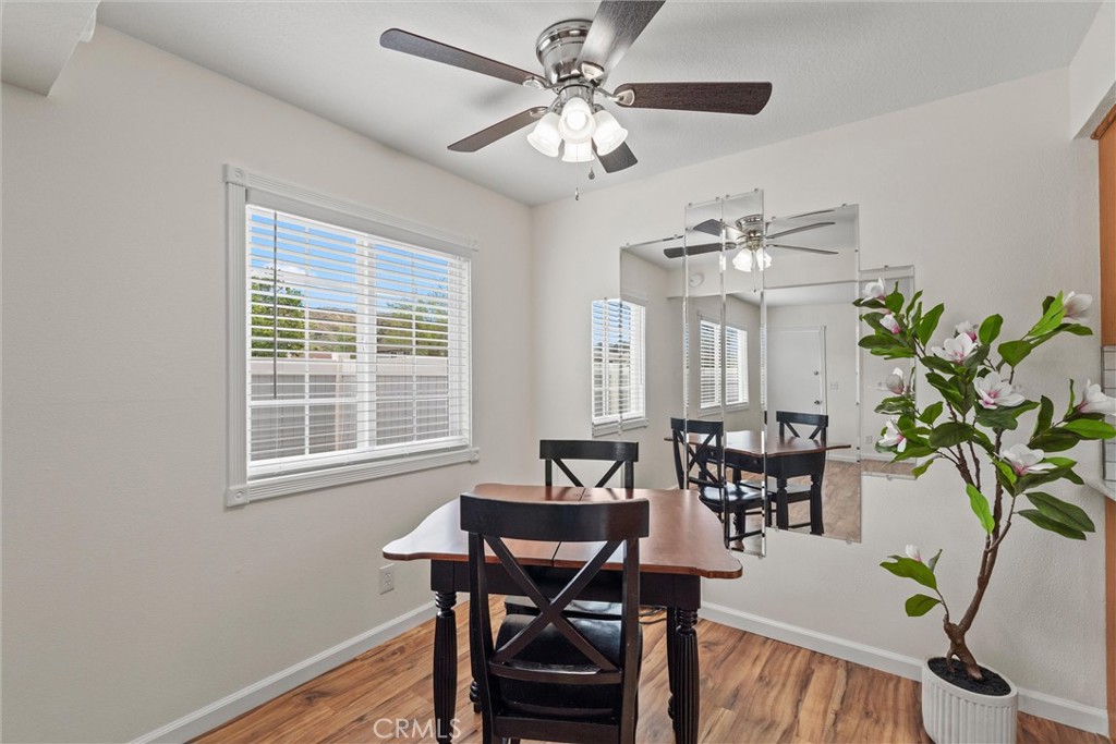 20800 Plum Canyon Road Saugus, CA 91350 - Photo 7 of 26 a view of a dining room with furniture window and wooden floor