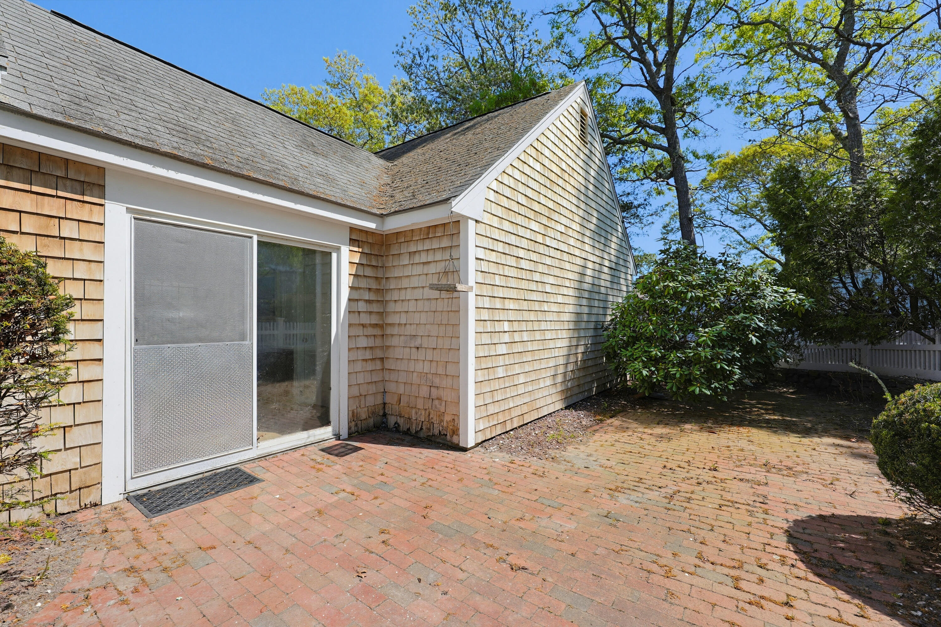 556 Cotuit Road Mashpee, MA 02649 - Photo 38 of 45 a view of backyard with potted plants